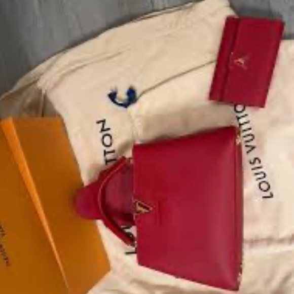 This is a Louis Vuitton Capucines Scarlet purse and matching wallet. - Picture 3 of 3